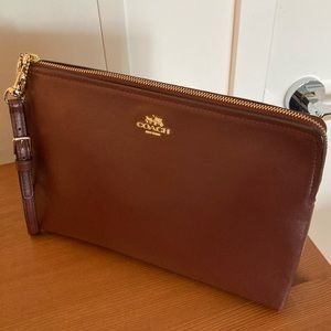 Coach wine colour leather pouch clutch wristlet